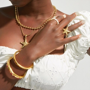 18k gold plated starfish necklace and ring set with pearl and red gemstone accents
