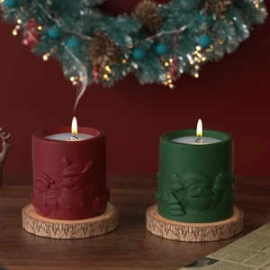 3D Santa Claus and snowman embossed candle cups with real flame and wooden base