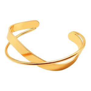 Minimalist double layered gold cuff bracelet featuring polished crisscross irregular design