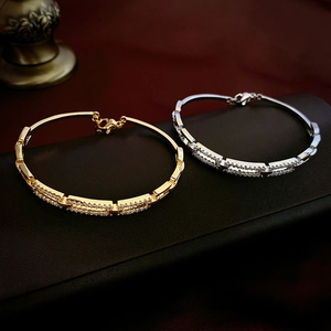 Luxe gold and silver plated bangles with double-row zircon pavé in a premium jewelry box