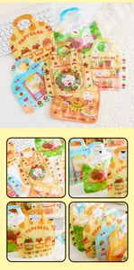 Detail showing colorful Capybara self-standing cookie bags with portable handle design