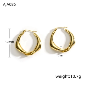 Detailed view of golden twisted hoop earrings showing 32mm size and 10.7g weight info