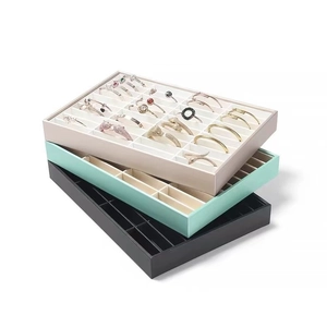 Velvet lined jewelry display trays for bracelets and rings in three elegant colors