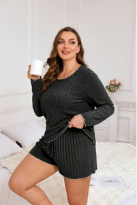 Detail of dark gray ribbed pajama set with long sleeves and white scalloped edge trimming
