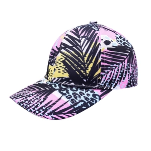 Detail of vibrant tie-dye baseball cap featuring palm leaves and leopard print patterns