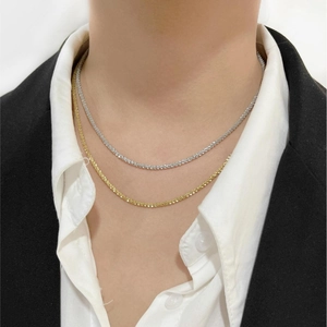 Minimalist titanium steel snowflake chain necklaces in gold and silver on model