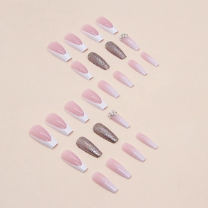 French tip ballerina press-on nails with silver glitter and pearl accents on beige background