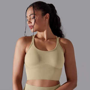 Detailed macro view of seamless ribbed hem and high-stretch fabric on the sports bra