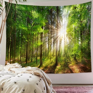 Detail showing sunlight filtering through a lush green forest on a large wall tapestry