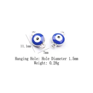 Detail view of evil eye charms with 11.1mm size and 1.5mm double loops for jewelry