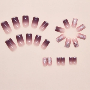 Detailed view of 24pcs lavender gradient press-on nails with silver glitter accents
