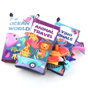 Three educational soft cloth books for babies with colorful 3D tails and hanging rings