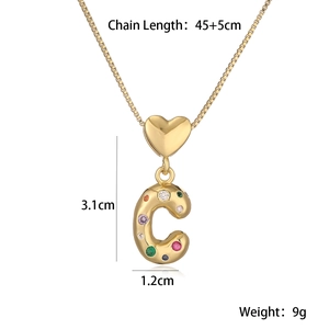 Macro detail of 18K gold letter C pendant showing dimensions 3.1cm height and 45cm chain length