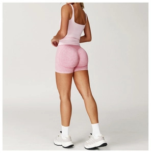 Vue arrière du short de yoga rose à taille haute avec effet push-up et tissu sans couture