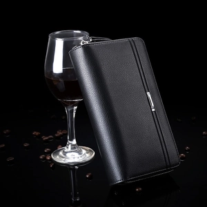 Macro detail of black leather wallet texture with silver zipper in luxury setting