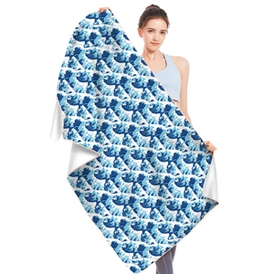 Detailed close-up of quick-dry microfiber beach towel with Great Wave off Kanagawa print