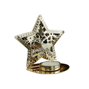 Golden star-shaped metal candle holder with elk cutout design and white tealight