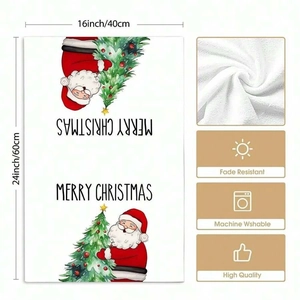 Detail of Christmas dish towel with Santa Claus pattern and fade resistant fabric