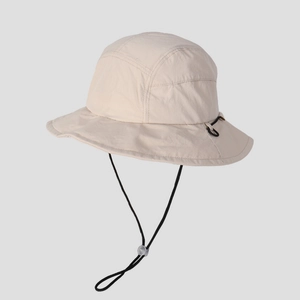 Detail of off-white hiking bucket hat with adjustable wind cord and stitching