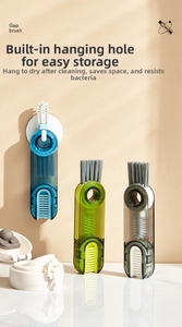 Three-in-one gap brush for cleaning bottle caps and lids with hanging hole in blue grey and green