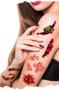 Realistic Halloween scar tattoos with fake bloody wounds and stitches on model's arm