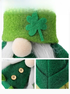 Macro detail of St. Patrick's Day green gnome showing clover hat and golden buttons