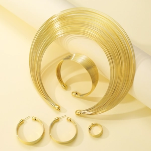 Chunky gold multi-layer choker necklace with matching bracelet and earrings jewelry set