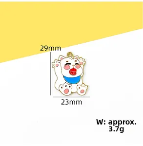 Detailed view of white enamel cat pendant with blue bib including 29x23mm dimensions