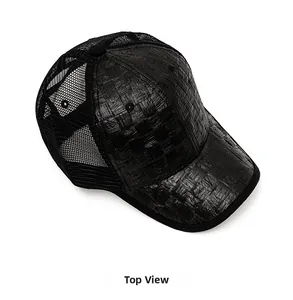 Top view of black woven straw baseball cap featuring breathable mesh panels and sturdy brim