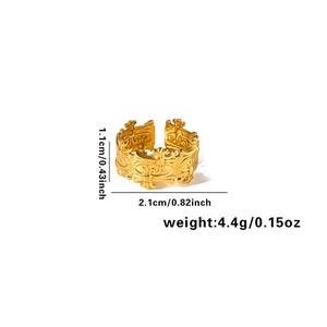 Detail showing 18K gold open ring with embossed cross patterns and size specifications