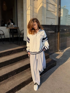 Women's grey quarter-zip tracksuit with letter embroidery in collegiate style