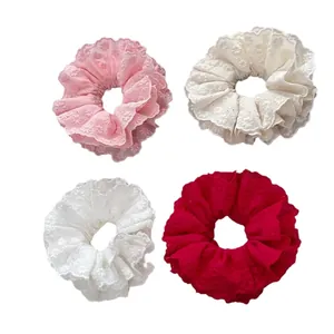 Set of 4 3D floral lace scrunchies in pink, beige, white, and red with embroidery
