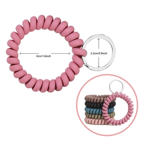Pink spiral spring keychain wristband with dimension labels and multiple color options