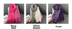 Detailed knit texture of cashmere-feel scarves in rose red, cyan green, and purple