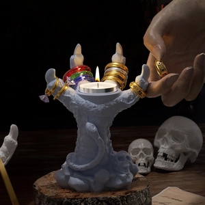 Gothic 3D dragon claw candle holder and jewelry display stand in matte grey finish