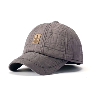 Deep grey quilted winter baseball cap for elderly men with warm padded fabric and leather tag