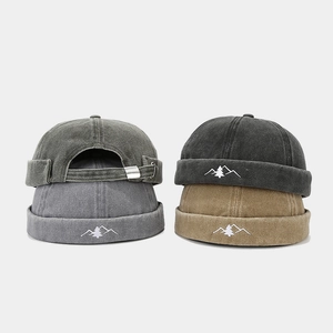 Vintage washed cotton docker hats with mountain embroidery in four assorted colors
