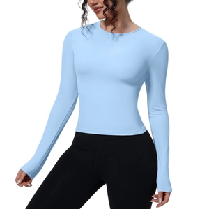 T-shirt de yoga bleu clair à manches longues pour femme en tissu respirant et extensible