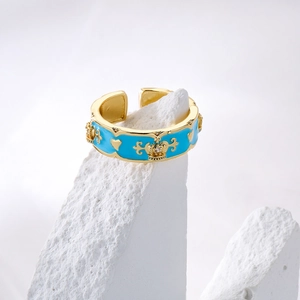 Adjustable 18K gold plated crown ring with blue enamel drips and sparkling zircon stones