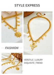 Detail of gold chunky Cuban chain necklace with sun and winged star pendants