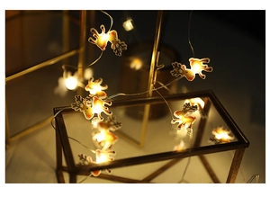 Close-up of lighted cartoon reindeer LED string lights on a geometric glass box