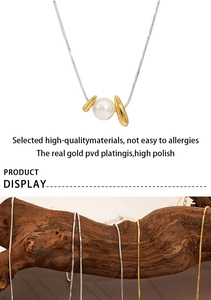 Detail of pearl pendant necklace with vacuum gold plating and high polish finish