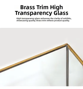 Detail of elegant gold brass frame and high-transparency glass panels for jewelry box