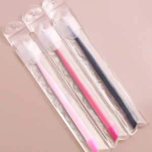 Three multi-color silicone mask brushes in individual plastic hanging packaging pouches