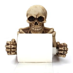 Detailed view of skull toilet paper holder with realistic resin bone texture and craft