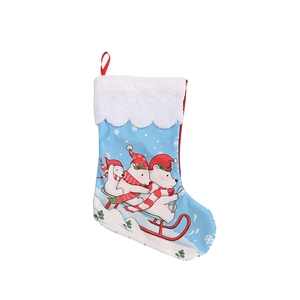Blue Christmas stocking with skiing polar bears and white faux fur trim holiday decor