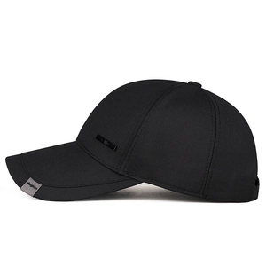 Business style black cotton baseball cap with metal logo for men, side profile view