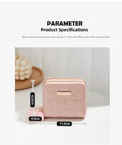 Pink quilted wallet detail with dimensions 11x10x4cm featuring gold trim and pompom
