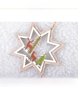 Detailed front view of hollow wooden star ornament with red reindeer and snowy pines