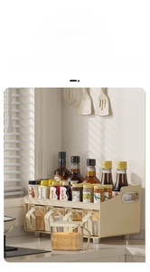 Detail of double-tier cream seasoning rack with four drawers and side handles